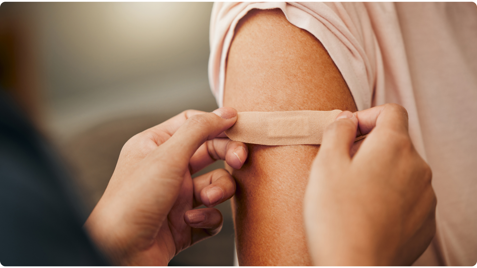 Bandaid on arm after vaccination
