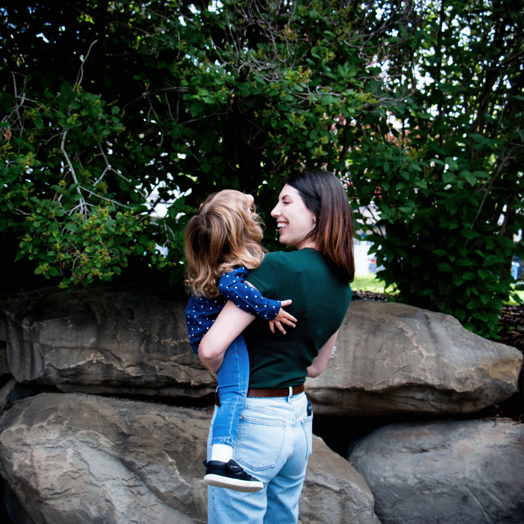 Mother holding young child