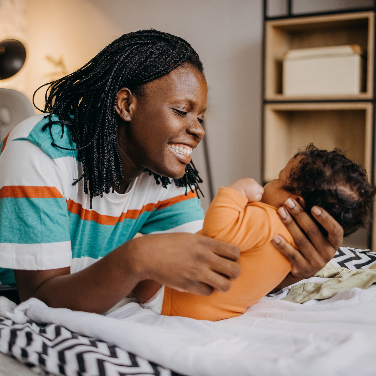 Woman holding newborn baby